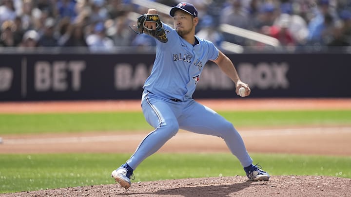 Jun 1, 2024; Toronto, Ontario, CAN; Toronto Blue Jays starting pitcher Yusei Kikuchi (16) throws against the Pittsburgh Pirates during the fourth inning at Rogers Centre. Mandatory Credit: John E. Sokolowski-USA TODAY Sports