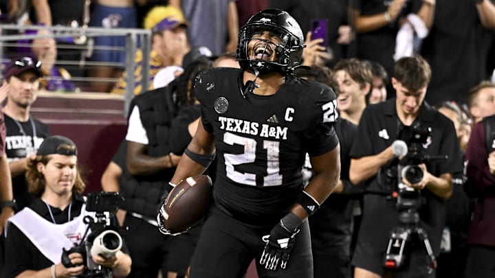 Oct 26, 2024; College Station, Texas, USA; Texas A&M Aggies linebacker Taurean York (21) reacts after catching the ball for an interception in the fourth quarter against the LSU Tigers at Kyle Field. Mandatory Credit: Maria Lysaker-Imagn Images. Oct 26, 2024; College Station, Texas, USA; Texas A&M Aggies linebacker Taurean York (21) reacts after catching the ball for an interception in the fourth quarter against the LSU Tigers at Kyle Field. Mandatory Credit: Maria Lysaker-Imagn Images.