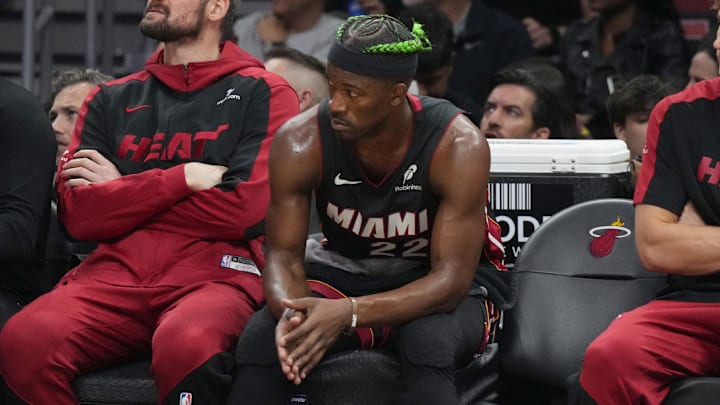 Jan 2, 2025; Miami, Florida, USA; Miami Heat forward Jimmy Butler (22) looks on from the bench during the second half at Kaseya Center. Mandatory Credit: Jim Rassol-Imagn Images Jan 2, 2025; Miami, Florida, USA; Miami Heat forward Jimmy Butler (22) looks on from the bench during the second half at Kaseya Center. Mandatory Credit: Jim Rassol-Imagn Images