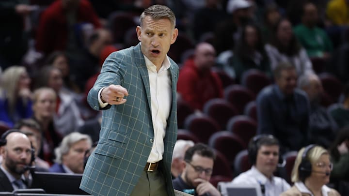Mar 23, 2025; Cleveland, OH, USA; Alabama Crimson Tide head coach Nate Oats coaches in the first half against the St. Mary's Gaels during the NCAA Tournament Second Round at Rocket Arena. Mandatory Credit: Rick Osentoski-Imagn Images