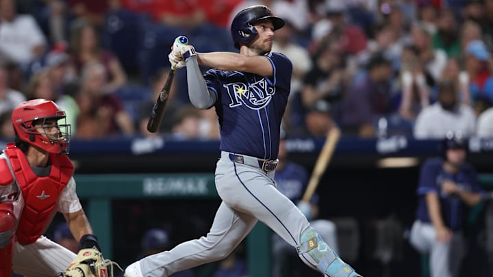 Tampa Bay Rays second base Brandon Lowe hits a triple against the Philadelphia Phillies on Sept. 11 at Citizens Bank Park.