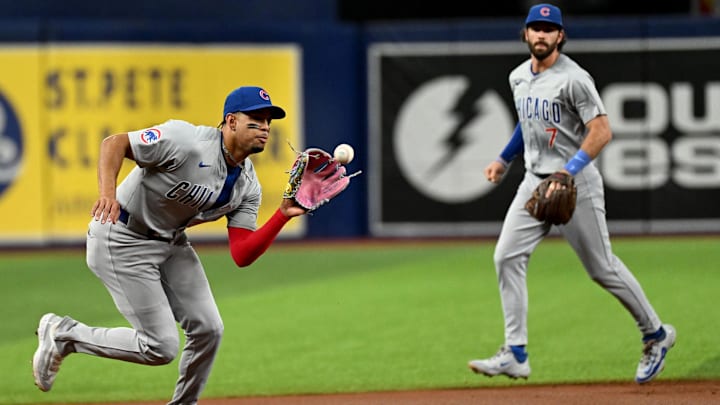 Jun 12, 2024; St. Petersburg, Florida, USA; Chicago Cubs third baseman Christopher Morel (5) fields a ground ball in the first inning against the Tampa Bay Rays at Tropicana Field. Mandatory Credit: Jonathan Dyer-USA TODAY Sports