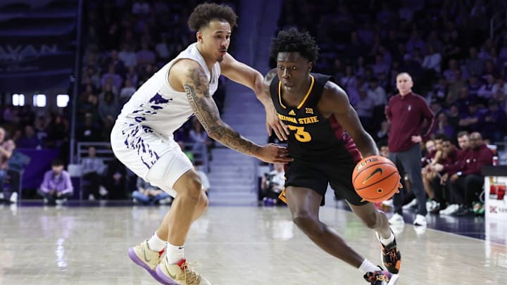 Arizona State Sun Devils guard Joson Sanon (3) dribbles against Kansas State Wildcats guard Max Jones (2) during the first half at Bramlage Coliseum.