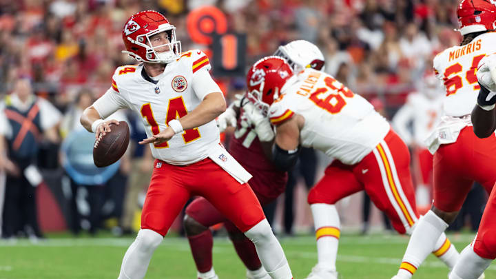 Aug 9, 2025; Glendale, Arizona, USA; Kansas City Chiefs quarterback Bailey Zappe (14) against the Arizona Cardinals during a preseason NFL game at State Farm Stadium. Mandatory Credit: Mark J. Rebilas-Imagn Images