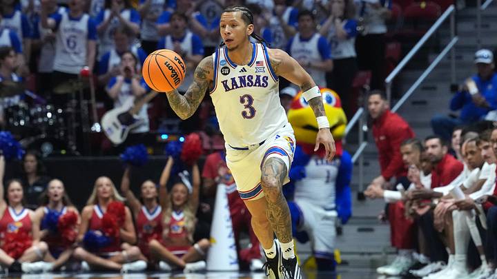 Mar 20, 2026; San Diego, CA, USA; Kansas Jayhawks guard Tre White (3) controls the ball against the California Baptist Lancers in the first half during a first round game of the men's 2026 NCAA Tournament at Viejas Arena. Mandatory Credit: Kirby Lee-Imagn Images Mar 20, 2026; San Diego, CA, USA; Kansas Jayhawks guard Tre White (3) controls the ball against the California Baptist Lancers in the first half during a first round game of the men's 2026 NCAA Tournament at Viejas Arena. Mandatory Credit: Kirby Lee-Imagn Images
