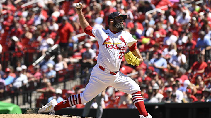Jun 30, 2024; St. Louis, Missouri, USA; St. Louis Cardinals pitcher Andrew Kittredge (27) throws against the Cincinnati Reds during the seventh inning at Busch Stadium. Jun 30, 2024; St. Louis, Missouri, USA; St. Louis Cardinals pitcher Andrew Kittredge (27) throws against the Cincinnati Reds during the seventh inning at Busch Stadium.