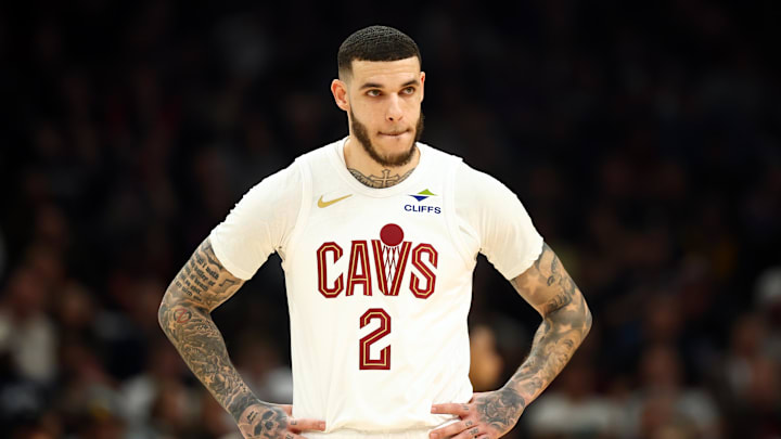 Jan 30, 2026; Phoenix, Arizona, USA; Cleveland Cavaliers guard Lonzo Ball (2) against the Phoenix Suns at Mortgage Matchup Center. Mandatory Credit: Mark J. Rebilas-Imagn Images