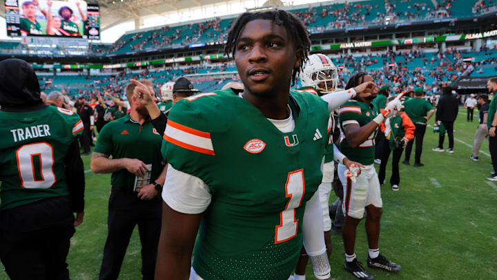 Nov 23, 2024; Miami Gardens, Florida, USA; Miami Hurricanes quarterback Cam Ward (1) looks on from the field after the game against the Wake Forest Demon Deacons at Hard Rock Stadium.  