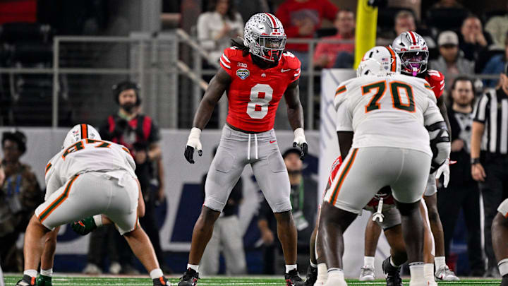 Dec 31, 2025; Arlington, TX, USA; Ohio State Buckeyes linebacker Arvell Reese (8) gets into position during the 2025 Cotton Bowl and quarterfinal game of the College Football Playoff at AT&T Stadium. Mandatory Credit: Jerome Miron-Imagn Images Dec 31, 2025; Arlington, TX, USA; Ohio State Buckeyes linebacker Arvell Reese (8) gets into position during the 2025 Cotton Bowl and quarterfinal game of the College Football Playoff at AT&T Stadium. Mandatory Credit: Jerome Miron-Imagn Images