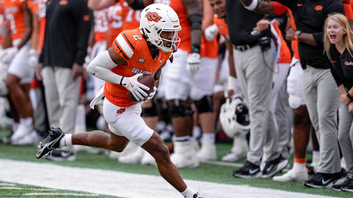 Oklahoma State wide receiver Terrill Davis catches a pass and runs out of bounds in the first quarter during an NCAA football game between Oklahoma State (OSU) and UT Martin in Stillwater, Okla., on Thursday, Aug. 28, 2025.