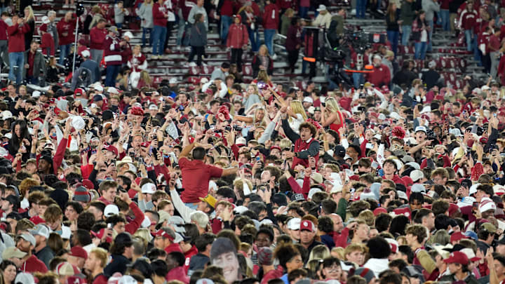 Fans stormed the field after Oklahoma took down Alabama 24-3 on Saturday. Fans stormed the field after Oklahoma took down Alabama 24-3 on Saturday.