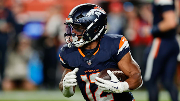 Denver Broncos running back RJ Harvey (12) rushes during the second quarter against the Cincinnati Bengals at Empower Field at Mile High. 