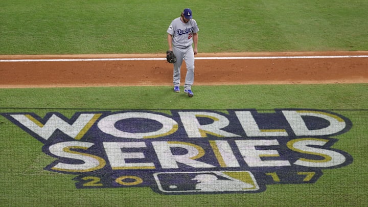 Oct 29, 2017; Houston, TX, USA; Los Angeles Dodgers starting pitcher Clayton Kershaw (22) reacts after being relieved by manager Dave Roberts (not pictured) in the fifth inning against the Houston Astros in game five of the 2017 World Series at Minute Maid Park. Mandatory Credit: Thomas B. Shea-Imagn Images