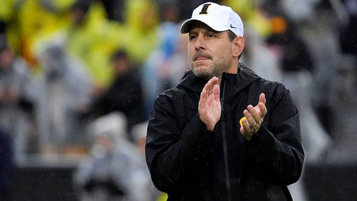 Iowa offensive coordinator Tim Lester watches warm ups Nov. 8, 2025 before a Big Ten Football game against the Oregon Ducks at Kinnick Stadium in Iowa City, Iowa.