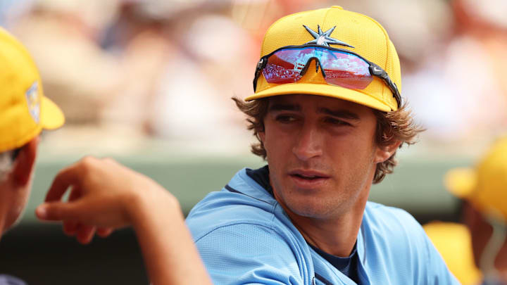 Mar 12, 2024; Sarasota, Florida, USA;  Tampa Bay Rays infielder Carson Williams (80) talks with manager Kevin Cash (16) before the game against the Baltimore Orioles at Ed Smith Stadium. Mandatory Credit: Kim Klement Neitzel-Imagn Images