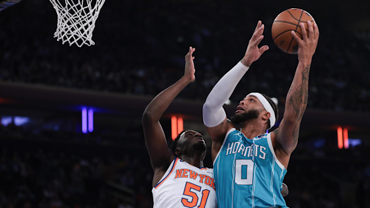 Oct 17, 2025; New York, New York, USA; Charlotte Hornets forward Miles Bridges (0) drives to the basket as New York Knicks forward Mohamed Diawara (51) defends during the first half at Madison Square Garden. Mandatory Credit: Vincent Carchietta-Imagn Images Oct 17, 2025; New York, New York, USA; Charlotte Hornets forward Miles Bridges (0) drives to the basket as New York Knicks forward Mohamed Diawara (51) defends during the first half at Madison Square Garden. Mandatory Credit: Vincent Carchietta-Imagn Images