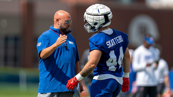 New York Giants Head Coach Brian Daboll speaks with New York Giants running back Cam Skattebo (44) during day one of the New York Giants training camp at Quest Diagnostics Giants Training Center in East Rutherford on Wednesday, July 23, 2025.