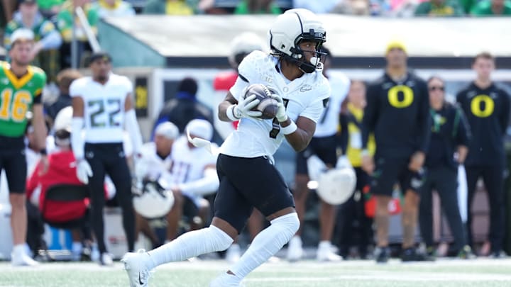 Dakorien Moore is one of the most electric talents to put on a uniform for the Ducks, but he's a true freshman. How realistic are fans' hope that he can be an instant-impact, No. 1 receiver?