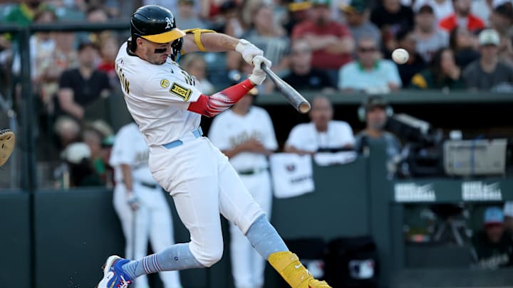 Jul 4, 2025; West Sacramento, California, USA; Athletics shortstop Jacob Wilson (5) hits a RBI double against the San Francisco Giants during the second inning at Sutter Health Park. Mandatory Credit: Dennis Lee-Imagn Images