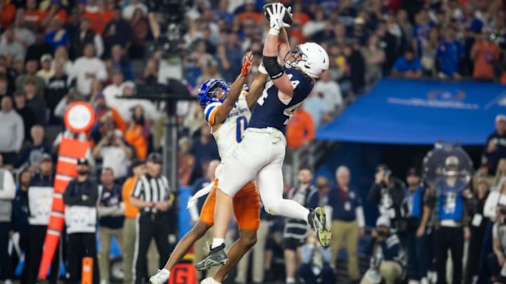Penn State Nittany Lions tight end Tyler Warren makes a touchdown catch over Boise State Broncos safety Ty Benefield during the Fiesta Bowl. 