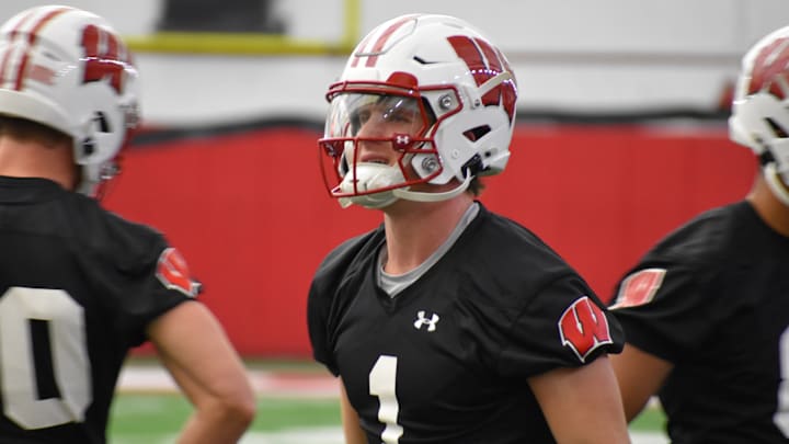 Wisconsin quarterback Colton Joseph takes part in practice. 