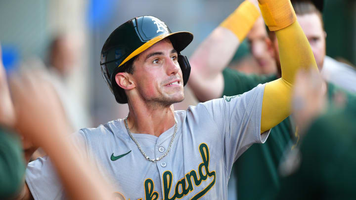 Jun 25, 2024; Anaheim, California, USA; Oakland Athletics third baseman Armando Alvarez (50) is greeted after scoring a run against the Los Angeles Angels during the third inning at Angel Stadium. Mandatory Credit: Gary A. Vasquez-USA TODAY Sports