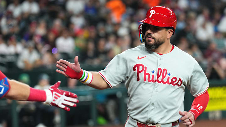 Philadelphia Phillies outfielder Kyle Schwarber (12) celebrates after scoring a run against the Arizona Diamondbacks during the first inning at Chase Field. 