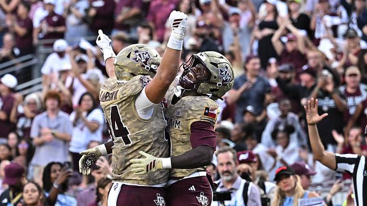Oct 3, 2026; College Station, Texas, USA; Texas A&M Aggies running back KJ Edwards (0) celebrates after scoreing a touchdown with tight end Richie Anderson III (84) during the first quarter against the Arkansas Razorbacks at Kyle Field. Mandatory Credit: Maria Lysaker-Imagn Images Oct 3, 2026; College Station, Texas, USA; Texas A&M Aggies running back KJ Edwards (0) celebrates after scoreing a touchdown with tight end Richie Anderson III (84) during the first quarter against the Arkansas Razorbacks at Kyle Field. Mandatory Credit: Maria Lysaker-Imagn Images