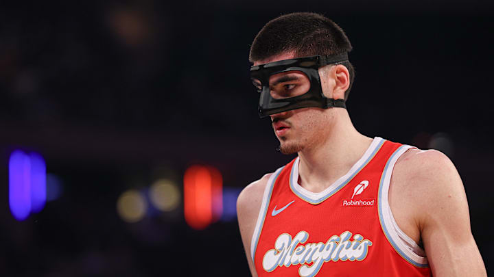 Jan 27, 2025; New York, New York, USA; Memphis Grizzlies center Zach Edey (14) looks up during the first half against the New York Knicks at Madison Square Garden. Mandatory Credit: Vincent Carchietta-Imagn Images