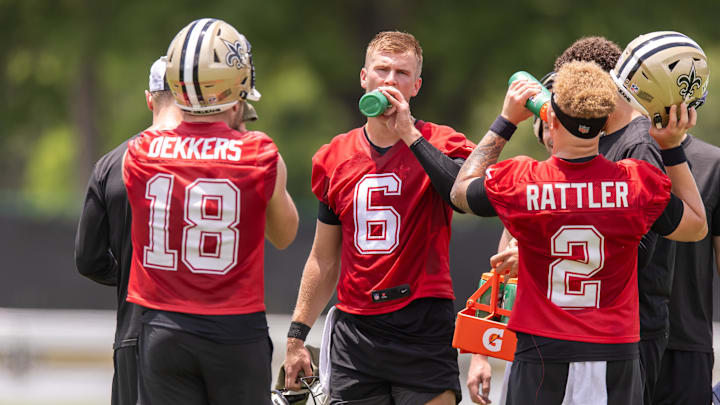Jun 10, 2025; New Orleans, LA, USA; New Orleans Saints quarterback Tyler Shough (6) and quarterback Spencer Rattler (2) and quarterback Hunter Dekkers (18) take a water break during minicamp at Ochsner Sports Performance Center. Mandatory Credit: Stephen Lew-Imagn Images Jun 10, 2025; New Orleans, LA, USA; New Orleans Saints quarterback Tyler Shough (6) and quarterback Spencer Rattler (2) and quarterback Hunter Dekkers (18) take a water break during minicamp at Ochsner Sports Performance Center. Mandatory Credit: Stephen Lew-Imagn Images