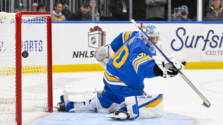 Dec 1, 2025; St. Louis, Missouri, USA; St. Louis Blues goaltender Joel Hofer (30) gives up a goal to Anaheim Ducks center Leo Carlsson (not pictured) during the third period at Enterprise Center. Mandatory Credit: Jeff Curry-Imagn Images