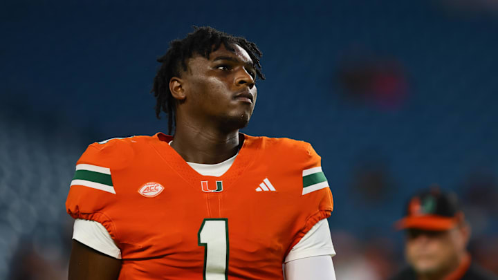 Sep 27, 2024; Miami Gardens, Florida, USA; Miami Hurricanes quarterback Cam Ward (1) looks on from the field before the game against the Virginia Tech Hokies at Hard Rock Stadium. Mandatory Credit: Sam Navarro-Imagn Images