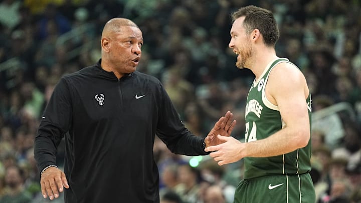 Apr 30, 2024; Milwaukee, Wisconsin, USA;  Milwaukee Bucks head coach Doc Rivers talks with guard Pat Connaughton (24) during the second quarter against the Indiana Pacers during game five of the first round for the 2024 NBA playoffs at Fiserv Forum.
