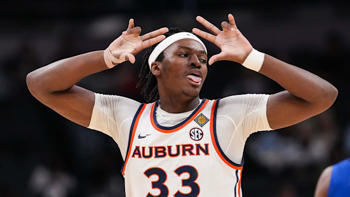 Auburn Tigers forward Sebastian Williams-Adams (33) celebrates a three-point basket Sunday, April 5, 2026, during the NIT men's basketball championship game at Gainbridge Fieldhouse in Indianapolis.