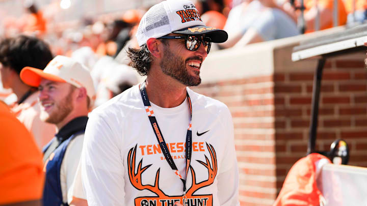 Tennessee baseball coach Tony Vitello smiles on the sidelines during a NCAA football game between Tennessee and Georgia at Neyland Stadium in Knoxville, Tennessee, on September 13, 2025. Tennessee baseball coach Tony Vitello smiles on the sidelines during a NCAA football game between Tennessee and Georgia at Neyland Stadium in Knoxville, Tennessee, on September 13, 2025.