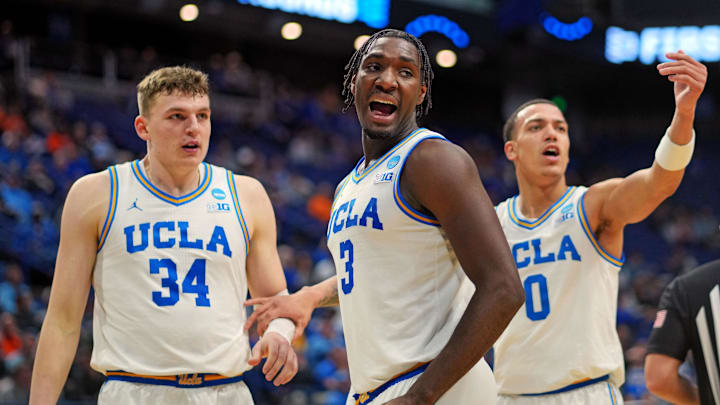 Mar 20, 2025; Lexington, KY, USA;  UCLA Bruins guard Eric Dailey Jr. (3) reacts during the second half against the Utah State Aggies in the first round of the NCAA Tournament at Rupp Arena. Mandatory Credit: Aaron Doster-Imagn Images