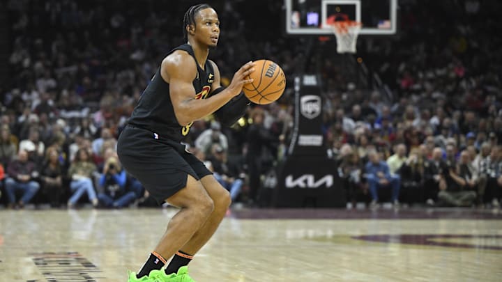 Nov 8, 2024; Cleveland, Ohio, USA; Cleveland Cavaliers forward Isaac Okoro (35) shoots in the first quarter against the Golden State Warriors at Rocket Mortgage FieldHouse. Mandatory Credit: David Richard-Imagn Images