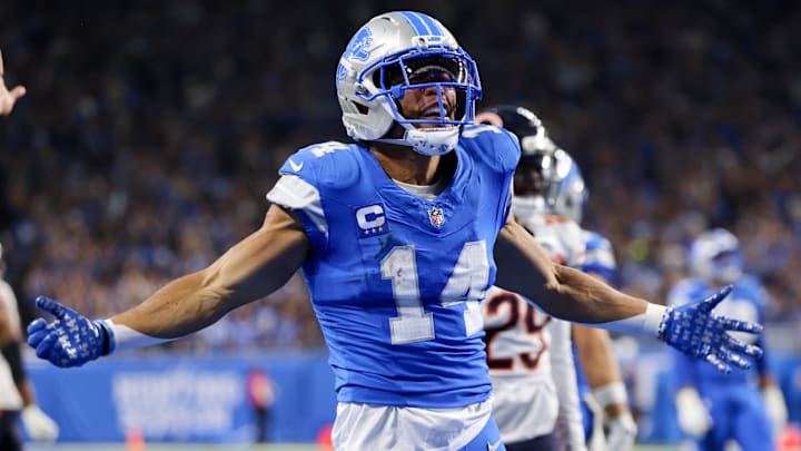 Sep 14, 2025; Detroit, Michigan, USA; Detroit Lions wide receiver Amon-Ra St. Brown (14) celebrates after a play against the Chicago Bears during the first quarter at Ford Field. Mandatory Credit: David Reginek-Imagn Images