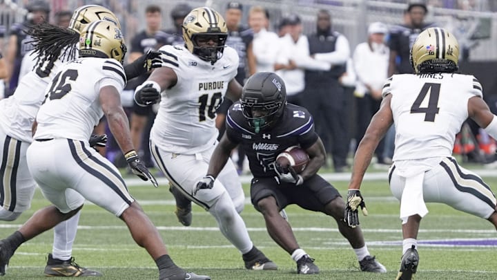 Northwestern Wildcats running back Joseph Himon II (6) runs the ball Northwestern Wildcats running back Joseph Himon II (6) runs the ball