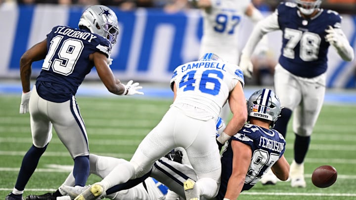 Dec 4, 2025; Detroit, Michigan, USA; Detroit Lions linebacker Jack Campbell (46) causes Dallas Cowboys tight end Jake Ferguson (87) to fumble during the first half at Ford Field. Mandatory Credit: Lon Horwedel-Imagn Images Dec 4, 2025; Detroit, Michigan, USA; Detroit Lions linebacker Jack Campbell (46) causes Dallas Cowboys tight end Jake Ferguson (87) to fumble during the first half at Ford Field. Mandatory Credit: Lon Horwedel-Imagn Images