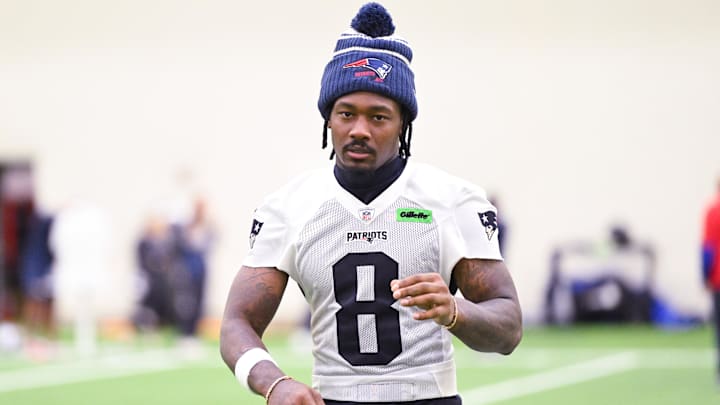 Jun 10, 2025; Foxborough, MA, USA; New England Patriots wide receiver Stefon Diggs (8) walks to the podium to speak to the media after minicamp held in the WIN Field House at Gillette Stadium. Mandatory Credit: Eric Canha-Imagn Images