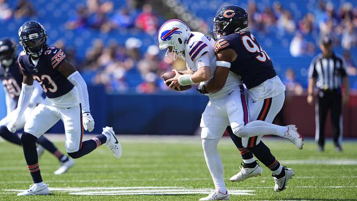 Edge player Daniel Hardy makes a tackle against Buffalo in preseason play.