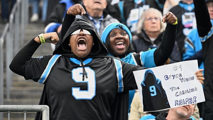 Dec 28, 2025; Charlotte, North Carolina, USA; Carolina Panthers fans cheer for their team against the Seattle Seahawks during the fourth quarter at Bank of America Stadium. Mandatory Credit: Bob Donnan-Imagn Images