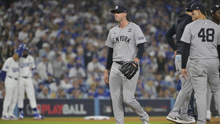 Oct 25, 2024; Los Angeles, California, USA; New York Yankees relief pitcher Clay Holmes (35) walks to the dugout in the seventh inning against the Los Angeles Dodgers during game one of the 2024 MLB World Series at Dodger Stadium. Mandatory Credit: Jayne Kamin-Oncea-Imagn Images Oct 25, 2024; Los Angeles, California, USA; New York Yankees relief pitcher Clay Holmes (35) walks to the dugout in the seventh inning against the Los Angeles Dodgers during game one of the 2024 MLB World Series at Dodger Stadium. Mandatory Credit: Jayne Kamin-Oncea-Imagn Images