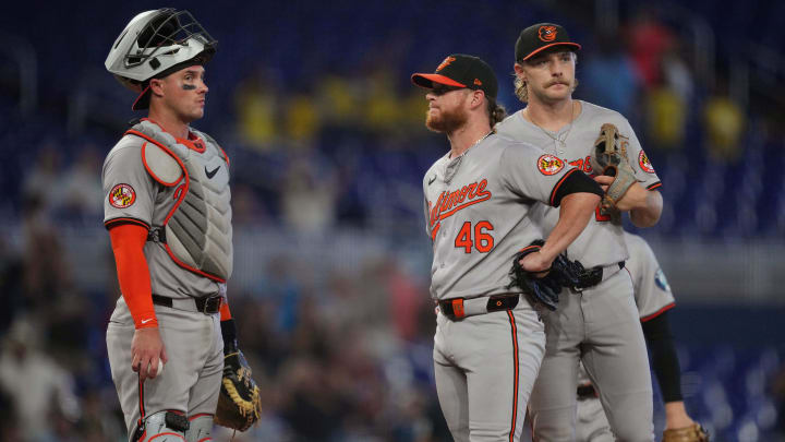 Jul 25, 2024; Miami, Florida, USA;  Baltimore Orioles pitcher Craig Kimbrel (46) has a meeting at the mound in the ninth inning against the Miami Marlins at loanDepot Park.