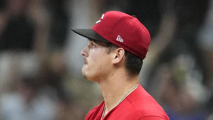 Jun 29, 2026; Milwaukee, Wisconsin, USA; Cincinnati Reds pitcher Chase Petty (61) watchers Milwaukee Brewers second baseman Brice Turang (2) (not pictured) home run go over the wall in the seventh inning at American Family Field. Mandatory Credit: Michael McLoone-Imagn Images