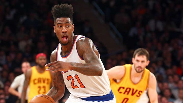 Dec 4, 2014; New York, NY, USA; New York Knicks shooting guard Iman Shumpert (21) controls the ball against the Cleveland Cavaliers at Madison Square Garden. The Cavaliers defeated the Knicks 90-87. Mandatory Credit: Brad Penner-Imagn Images