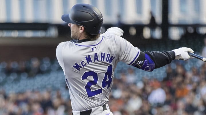 Colorado Rockies third baseman Ryan McMahon (24) hits a two-run double Colorado Rockies third baseman Ryan McMahon (24) hits a two-run double