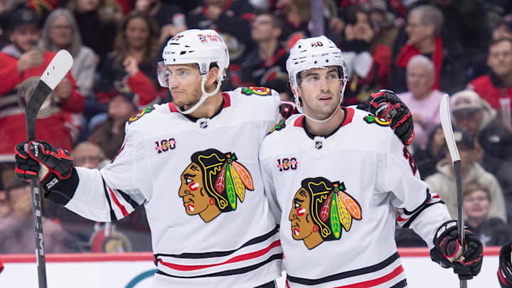 Dec 20, 2025; Ottawa, Ontario, CAN; Chicago Blackhawks left wing Andre Burakovsky (28) celebrates with center Ryan Greene (20) his goal scored in the second period against the Ottawa Senators at the Canadian Tire Centre. Mandatory Credit: Marc DesRosiers-IMAGN Images