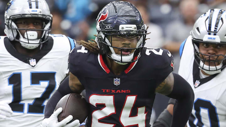  Houston Texans cornerback Derek Stingley Jr. (24) runs with the ball during the first quarter against the Carolina Panthers at NRG Stadium.